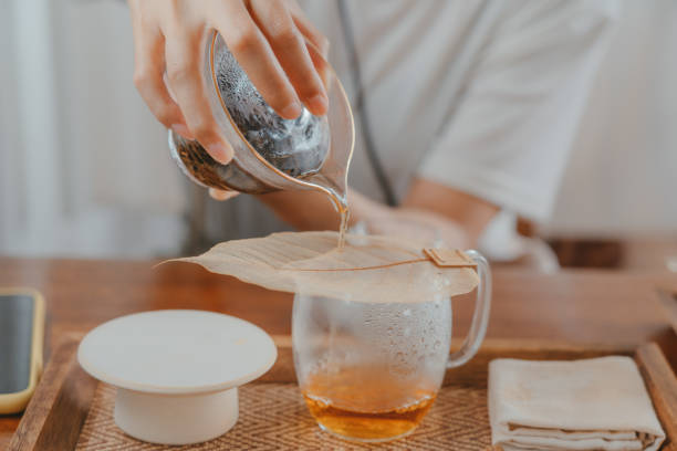 istock An woman is brewing the tea 1341878582