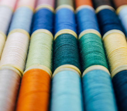 Colorful plastic yarns on rolls for sewing