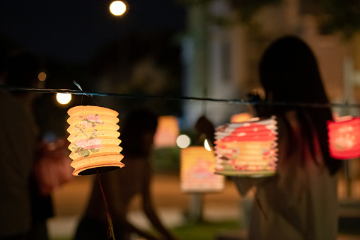Colorful Illuminated Lanterns hanging outdoor. Moon cake festival, Mid-Autumn Festival, Chinese lantern Festival