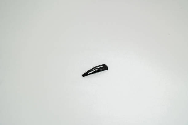 istock Black hair clips on isolated white background 1341883472