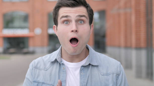 istock Shocked, Outdoor Wondering Young Man 1341884387