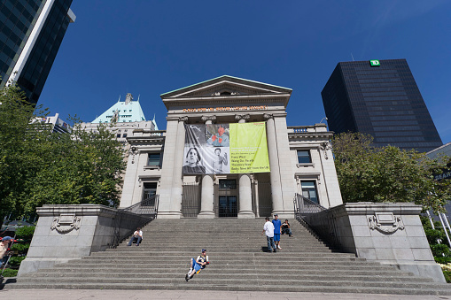 Vancouver, Canada - August 5, 2005: Vancouver Art Gallery in front of Hotel Vancouver, Canada. The Vancouver Art Gallery is a neoclassical building, was designed by Francis Rattenbury, built 1906 and is the largest art gallery in Western Canada.