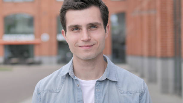 istock Outdoor Young Man Accepting By Shaking Head 1341889283