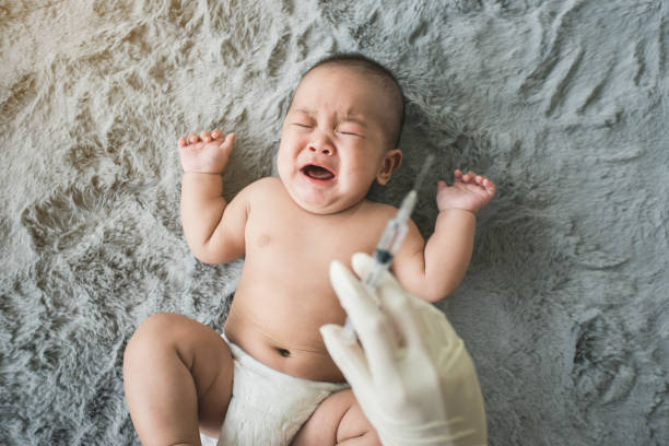 istock Asian baby cried when he found a syringe on hand paediatrician. 1341890315