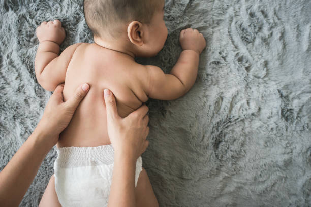 istock Massaging back muscle infant for relaxing. 1341890350