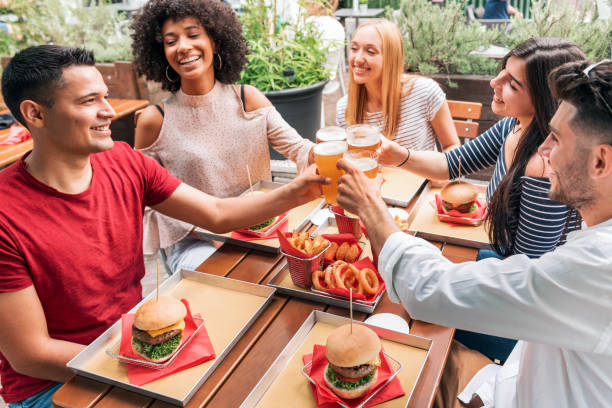 istock Diverse friends celebrating a friend birthday 1341890752