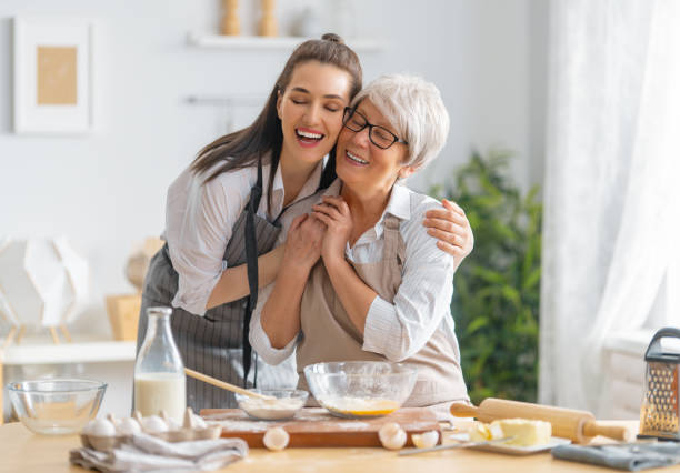istock family are preparing bakery together 1341900417
