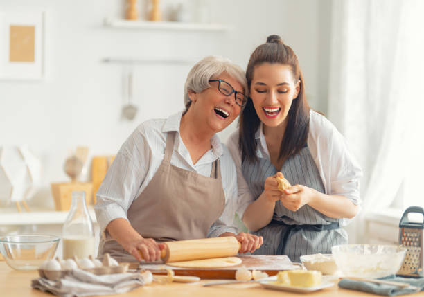 istock family are preparing bakery together 1341900452