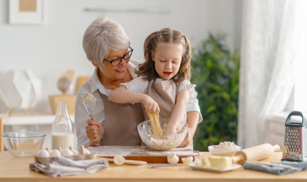 istock family are preparing bakery together 1341900473
