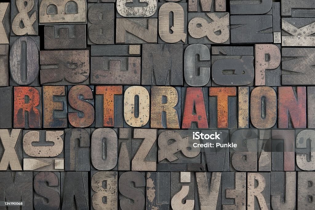 Restoration The word Restoration written in very old letterpress type Abstract Stock Photo