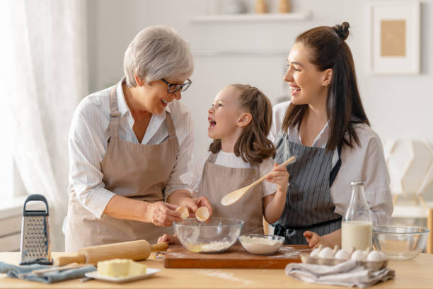 istock family are preparing bakery together 1341901031
