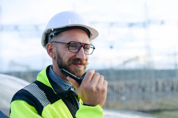 istock Close Up Portrait Of Engineer Talking On A Walkie-Talkie 1341901044