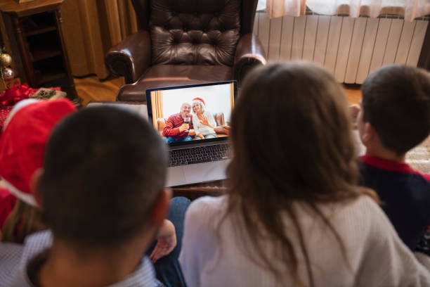 istock Young Family is having video call during Christmas Holidays. 1341901049
