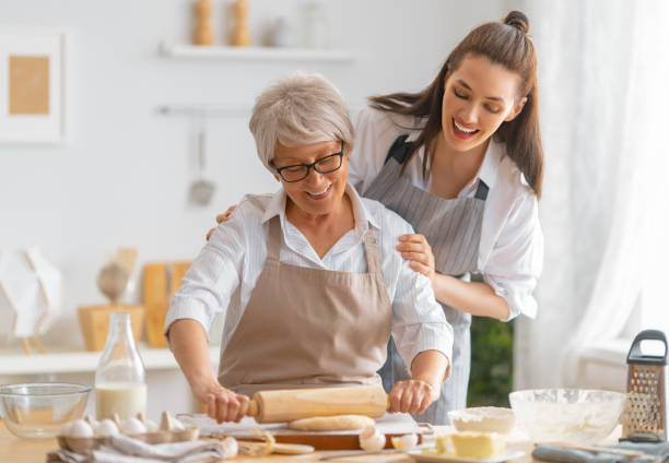 istock family are preparing bakery together 1341901124