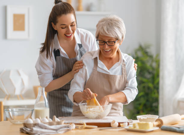 istock family are preparing bakery together 1341901601