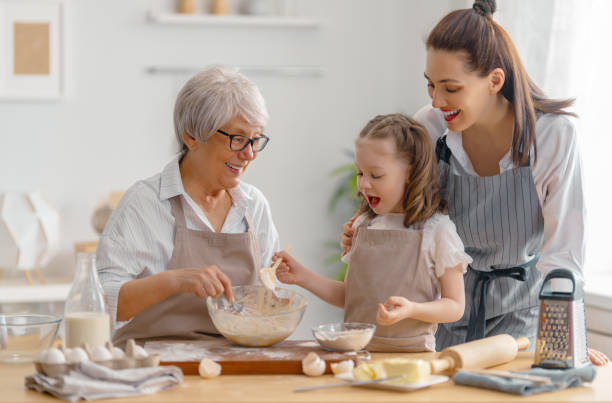 istock family are preparing bakery together 1341901783