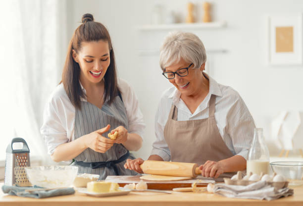 istock family are preparing bakery together 1341901799