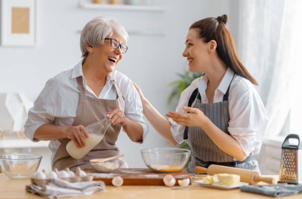 istock family are preparing bakery together 1341901873