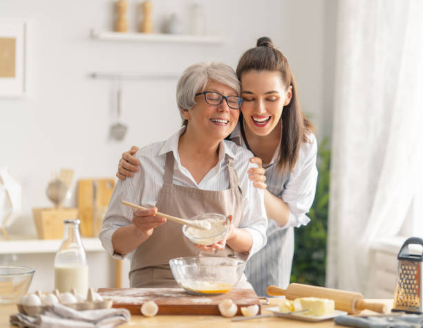 istock family are preparing bakery together 1341901888