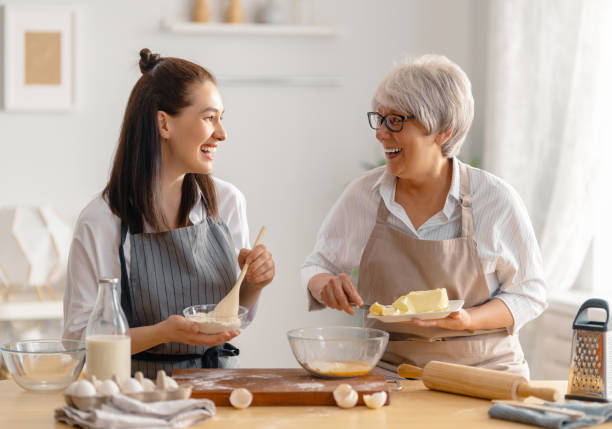 istock family are preparing bakery together 1341901895