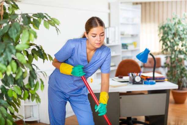 istock Woman cleaning floor with mop 1341904598