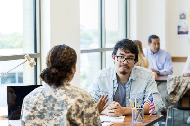istock Man listens carefully to female recruiter 1341908204