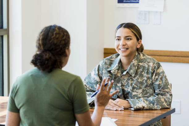 istock Emotionally stressed female soldier listens to unrecognizable superior 1341908226