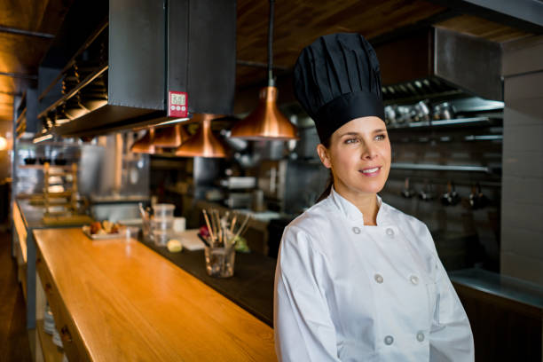 istock Portrait of a chef at a restaurant and smiling 1341912080