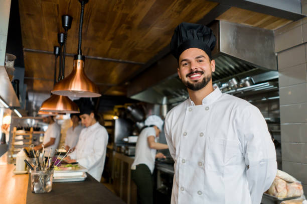 istock Portrait of a successful chef working at a restaurant 1341912117
