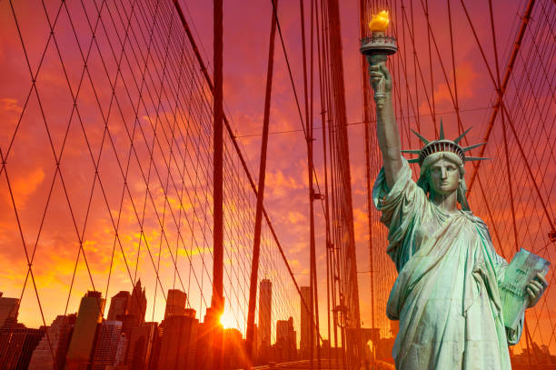 istock Liberty Statue and Brooklyn bridge New York 1341913525