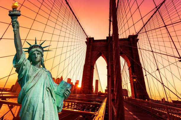 istock Liberty Statue and Brooklyn bridge New York 1341913590