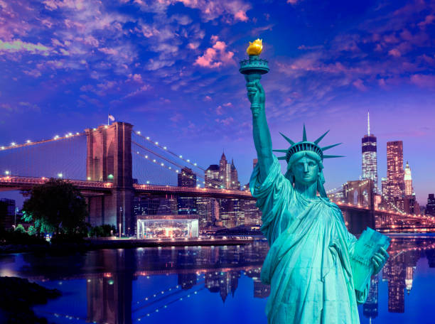 istock Liberty Statue and Brooklyn bridge New York 1341913709