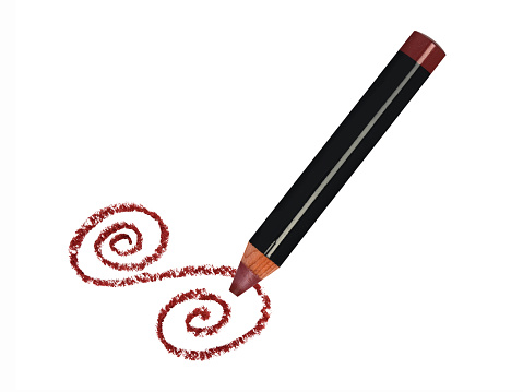 Black lip pencil with red trace isolated on white background