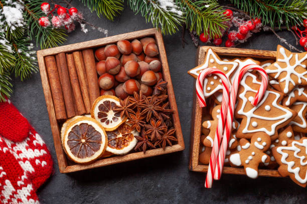istock Christmas card with gingerbread cookies and spices 1341919646