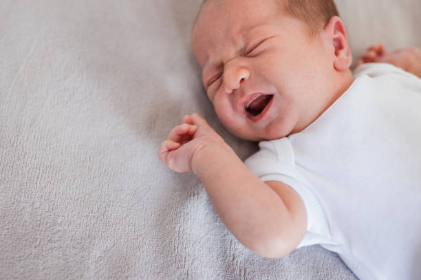 istock Newborn baby crying 1341920767