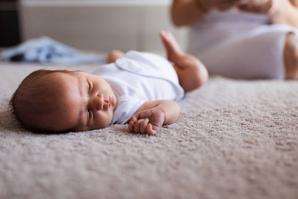istock Newborn baby lying on the blanket 1341920872