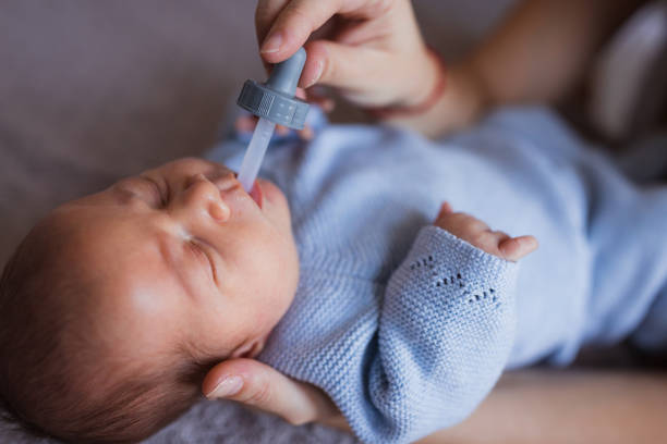 istock Baby eating with pipette 1341920963