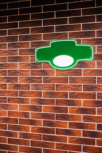 istock Green address plate on a brick wall 1341923121