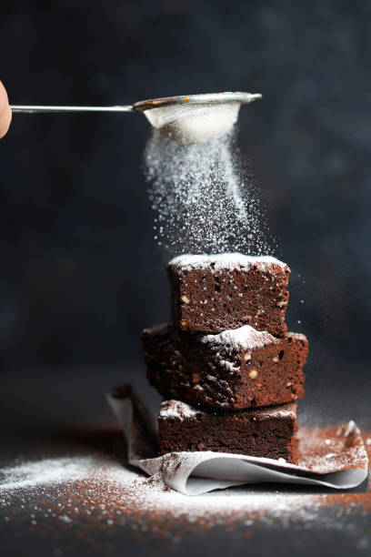 istock Chocolate brownie on black and gray background for pastry 1341924647