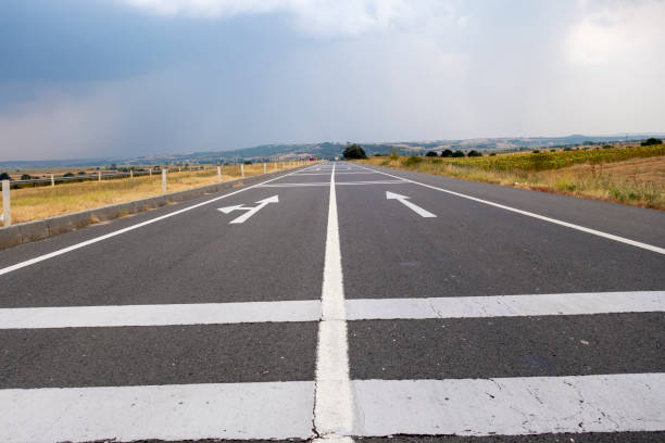 istock Road leading into the distance... 1341925736