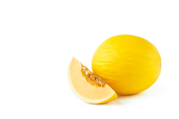 istock Melon on a white background. Yellow melon on a white isolate. Fresh juicy piece of melon with shadow on a white background. For insertion into a project, design or advertisement 1341928496
