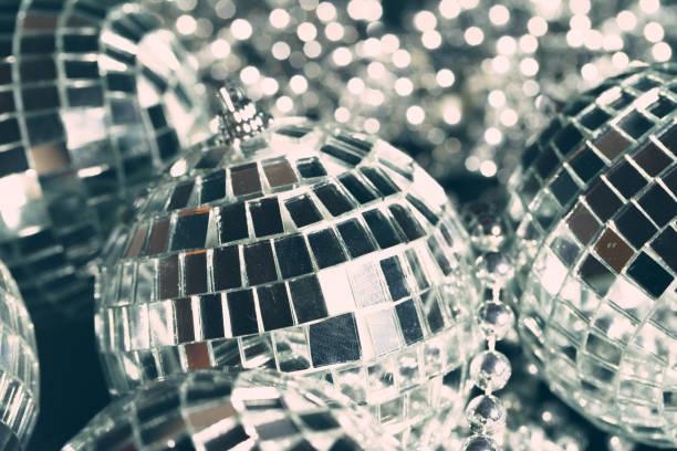 istock Mirror balls reflecting lights close up, nightlife background 1341929773