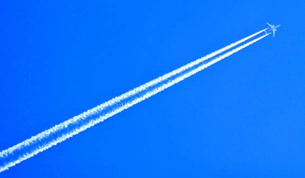 istock high flying jet plane with vapour trail 1341930277