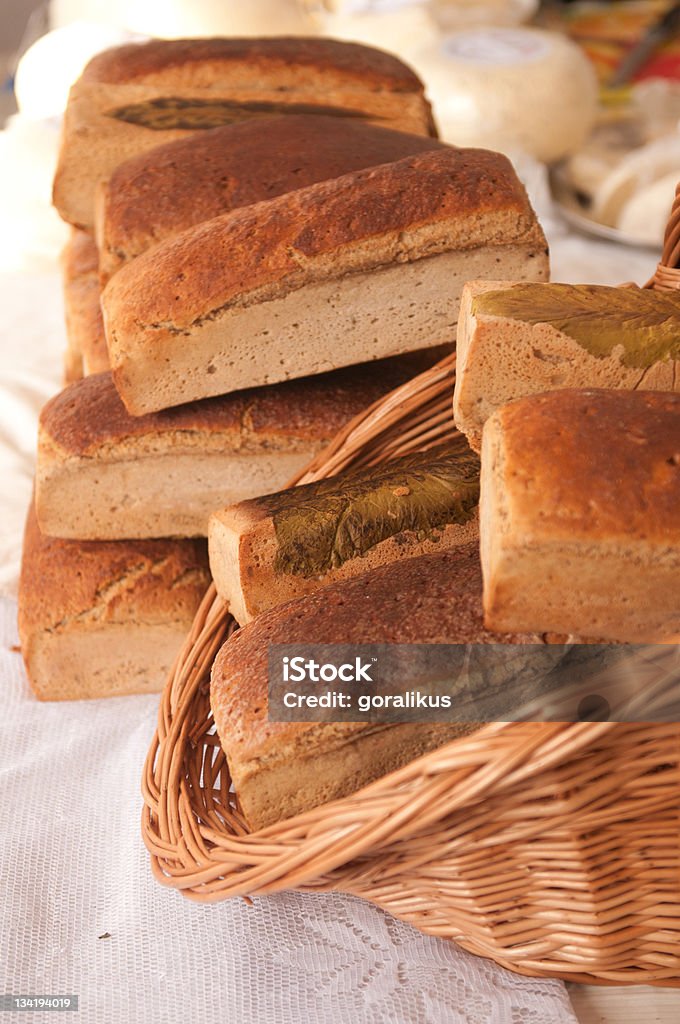 Stack of bread in the basket. Stack of bread on the farmer market. 7-Grain Bread Stock Photo