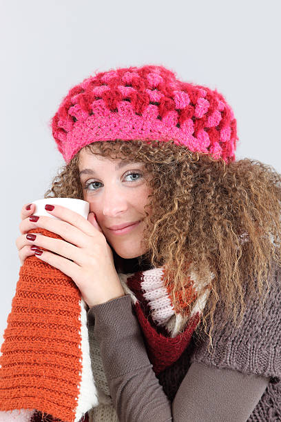 Woman with hot drink stock photo