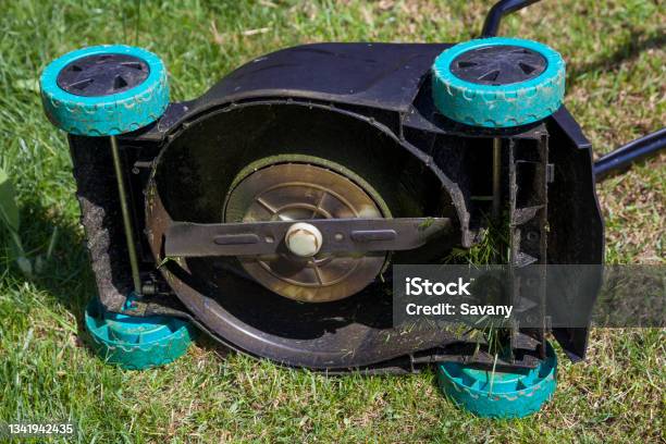 Mower From Below Stock Photo - Download Image Now - Lawn Mower, Blade, Cutting