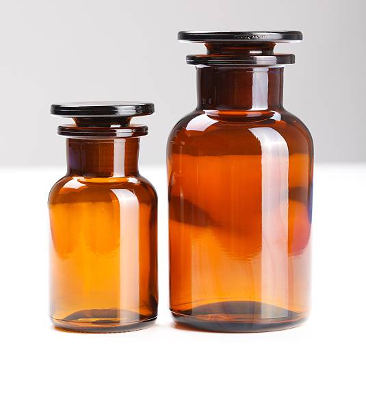 istock Pair of empty chemical glass bottles 134194621
