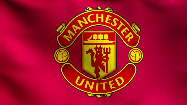 Manchester United F.C. Flag blowing in the wind. Emblem of Football Club FC Premier League. Champion winner in soccer. 3d illustration. Sport team game.