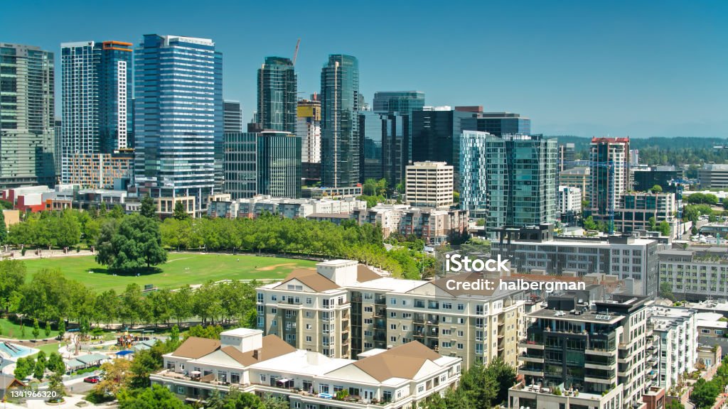 Bellevue Downtown Park on a Sunny Day - Drone Shot Aerial shot of Bellevue, Washington on a sunny day in summer, looking towards the modern office towers and Downtown Park. Bellevue - Washington State Stock Photo