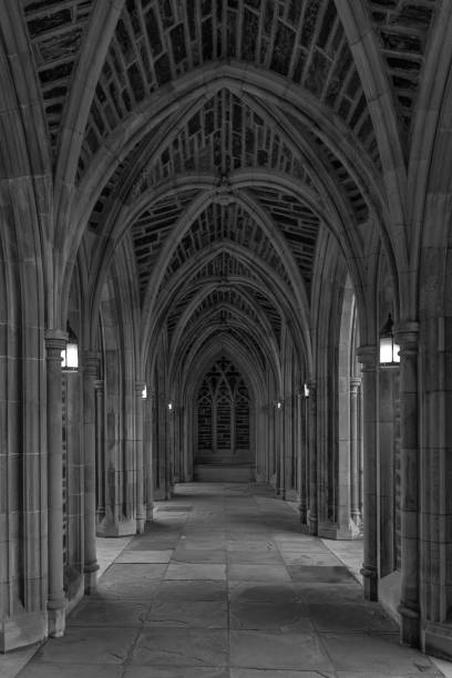 istock Gothic arched hallway Black and White old world construction. 1341966514